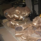 In fonderia - pezzi di bronzo di una Diana Cacciatrice in attesa di essere saldati assieme
